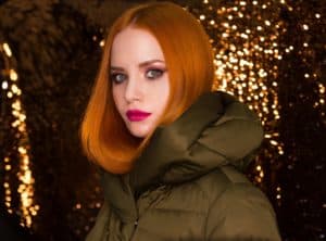 Caitlin Craig Lawrence styling a green look, reflecting her signature palette